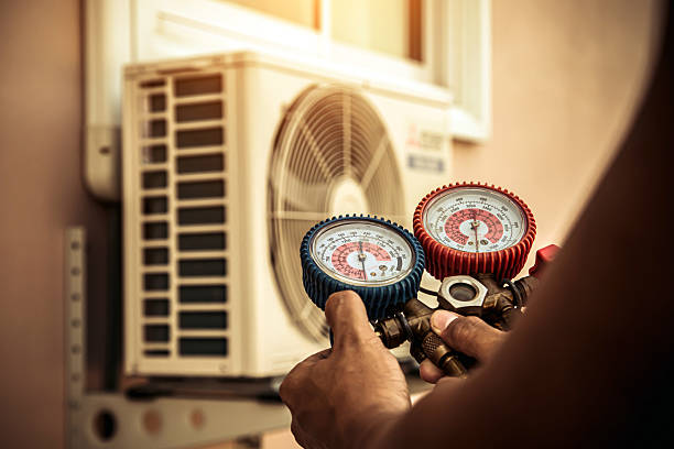 Professional Air Conditioning Service technician working in Connell, WA